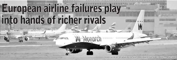  ??  ?? Monarch aircraft are seen parked after the airline ceased trading, at Luton airport in Britain. — Reuters photo