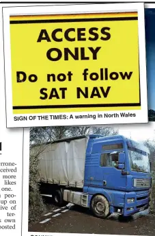  ??  ?? in North Wales SIGN OF THE TIMES: A warning COUNTRY LIFE: A lorry driver stuck in a lane