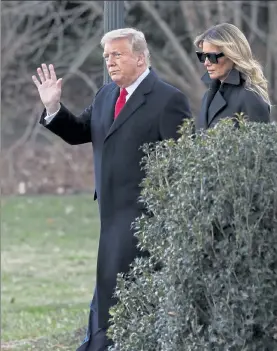  ?? OLIVER CONTRERAS / NYTNS ?? President Donald Trump and first lady Melania Trump walk to board Marine One on the South Lawn of the White House on Wednesday.