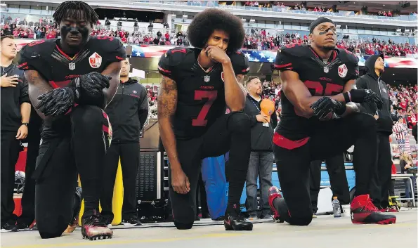  ?? THEARON W. HENDERSON/GETTY IMAGES FILES ?? The Baltimore Ravens’ owner says the team will not sign Colin Kaepernick, centre, although he supports his right to non-violent protest.