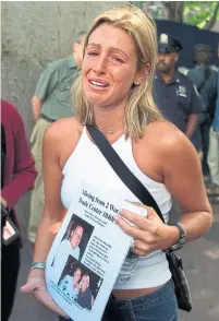  ?? ANDREW VAUGHAN ?? Rachel Uchitel first made headlines when she searched for her fiancé following the 9/ 11 attacks in 2001. In 2009, she was back in the news for her affair with Tiger Woods.