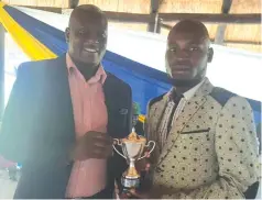 ??  ?? NUMERO . . . Tenax top man, Farai Mugumwa receiving the Zifa Eastern
UNO FC Region top goal scorer and soccer star of the year awards for the 2019 season from Zifa board member, Sugar Chagonda, during a belated end of year awards ceremony held early this year at Chancellor Junior School