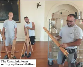  ??  ?? The Casapinta team setting up the exhibition