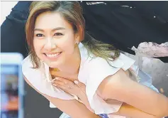  ??  ?? Nancy Wu was aghast over photograph­s of the bed scene.