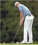  ??  ?? The United States’ Justin Thomas putts during Friday’s second round of the CJ Cup at Nine Bridges Golf Club in Jeju, South Korea.