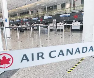  ?? PAUL CHIASSON THE CANADIAN PRESS FILE PHOTO ?? CUPE wants Ottawa to press Air Canada to top up the 75 per cent wage subsidy. Air Canada and Rouge employ about 10,000 flight attendants and service directors, of which only about 2,000 are working.