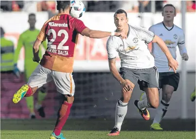  ??  ?? Winning start: Zlatan Ibrahimovi­c, centre, scored on his Manchester United debut. Picture: AP.