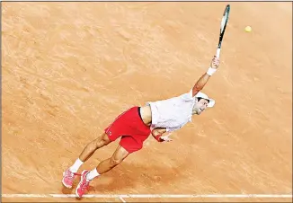  ??  ?? Serbia’s Novak Djokovic returns the ball to Germany’s Dominik Koepfer during their quarter-final match at the Ital
ian Open tennis tournament in Rome on Sept 19. (AP)