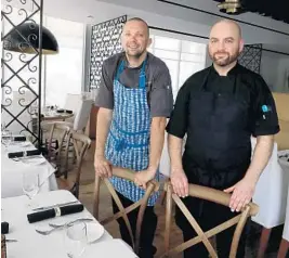  ?? CARLINE JEAN/SOUTH FLORIDA SUN SENTINEL ?? Executive corporate chef Joel Ehrlich, left, and chef de cuisine Dave Martell are at the helm of Valentino Cucina Italiana in Fort Lauderdale.