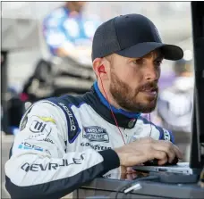  ?? JASON MINTO — THE ASSOCIATED PRESS ?? Ross Chastain looks at data on a computer during a NASCAR Xfinity Series practice at Dover Motor Speedway last Saturday in Dover, Del.