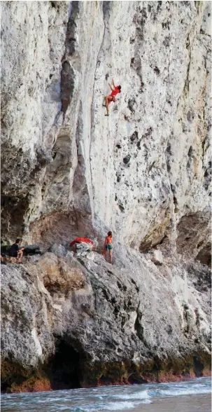  ??  ?? Above:
Nina Caprez climbing
Jon Siegrist’s new route