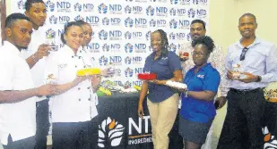  ??  ?? From left: The staff at NTD Ingredient­es – Ramon Lewis, Keron Bryan, Auriel Swaby (pastry chef), JoniAnn Lawson (pastry chef), Natalee Scarlette, Kerry-Ann Duncan, Anthony Cooke (general manager), and Junior Christie.