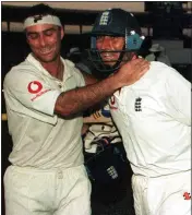  ??  ?? DARK KNIGHTS: Graham Thorpe (left) and Nasser Hussain (right) celebrate in Karachi in 2000 after sealing victory against Pakistan in the gloom