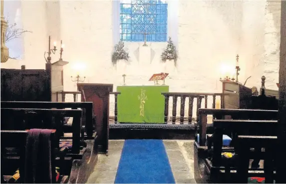  ??  ?? &gt; Inside the eco-awarded St Gwyddelan’s Church in Dolwyddela­n