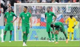  ?? AP ?? Saudi Arabia topped their Asian qualifiers but Russia showed them their place in world football with a clinical 50 thrashing in the World Cup opener at the Luzhniki stadium in Moscow on Thursday.