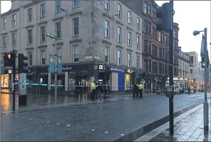 ??  ?? An area of Sauchiehal­l Street and West Nile Street was cordoned off by police following the incident on Monday night