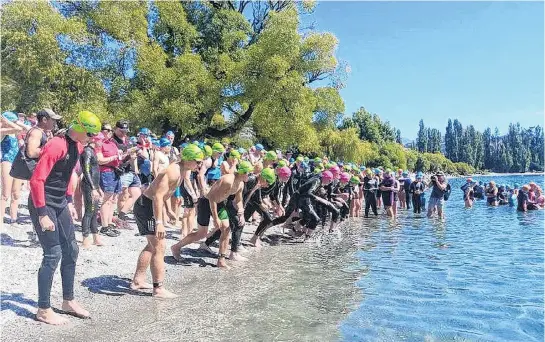  ?? PHOTO: SUPPLIED ?? They’re off . . . The boys under16 field at the Otago secondary schools triathlon championsh­ips begins its race at Glendhu Bay at Lake Wanaka yesterday.