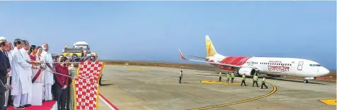  ?? PTI ?? Civil Aviation Minister Suresh Prabhu and Kerala Chief Minister Pinarayi Vijayan flag off the first flight during a ceremony to inaugurate Kannur Internatio­nal Airport yesterday.