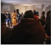  ?? (The New York Times/James Hill) ?? Participan­ts sing traditiona­l wake songs on All Saints’ Day on Nov. 1 at a community center in Saint-Denis on the outskirts of Paris to honor people from the Antilles who had died.