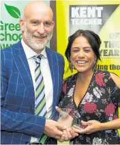  ?? ?? Kent Secondary School Teacher of the
Year, Fiona Ravate of the Rowans Academy. Presented by Tom Stanley