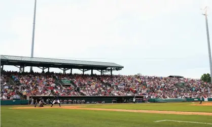  ?? Photograph: Streeter Lecka/ Getty Images ?? The Charleston RiverDogs play at Joseph P Riley Jr Park during a more crowded game than on Nobody Night.