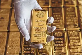  ?? bloomberg ?? Untapped asset: a file photo of gold bullion. Trade bodies in Vietnam say they are willing to work with the central bank on developing the country’s gold market.—