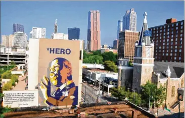  ?? LOSS PREVENTION ?? The “Hero” mural depicting civil rights leader U.S. Rep. John Lewis was created by Sean Schwab, an Atlanta-based artist with the Loss Prevention arts collective.