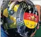  ??  ?? The modified helmet features four golden stars, one for each of Germany’s wins.