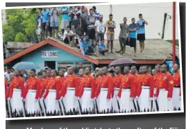  ?? Picture LUKE: RAWALAI ?? Members of the public take to the rooftop of the Fiji Football Associatio­n lounge to get a glimpse of the parade among the crowd at Subrail Park.