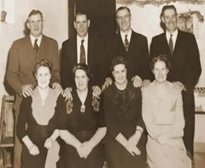  ??  ?? A FAMILY: McCallions in America, 1947. Back row: James, Patrick, George and Joe (known in Ireland as Alfie). Front row: Mary, Kathleen, Bridget and Sarah Frances. The photo was taken when Bridget, the only sibling to remain in Ireland, visited her family in the US. Photo courtesy of Ted Zimbo. Below: War of Independen­ce medal