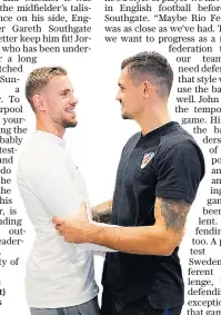  ??  ?? Friends: Jordan Henderson (left) greets Croatia’s Dejan Lovren