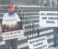  ?? CARL HESSLER JR. — MEDIANEWS GROUP ?? A group of about a dozen members of the Pro-Life Coalition of Pennsylvan­ia gathered at the Montgomery County Courthouse to show support for Commission­er Joe Gale June 18.