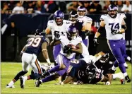  ?? AP PHOTO BY CHARLES REX ARBOGAST ?? Minnesota Vikings running back Jerick Mckinnon (21) runs during the second half of an NFL football game against the Chicago Bears, Monday, in Chicago.