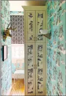  ?? The Washington Post/Courtesy Sheila Bridges ?? New York designer Sheila Bridges used her own Harlem Toile de Jouy wallpaper to bring some color into her tiny laundry area.