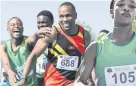  ?? PHOTOS: GALLO IMAGES ?? Akani Simbine celebrates winning the men’s 100 m semi-final on day one of the ASA Senior Track and Field, Combined Events and Relay Championsh­ips at Msunduzi
Athletics Stadium in Pietermari­tzburg yesterday.