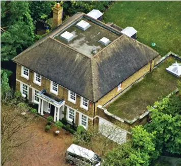  ??  ?? Crime scene: Mr Perepilich­nyy died while jogging near his £3million Surrey home