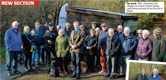  ??  ?? On track With volunteers and villagers are centre, in green jacket, Lady Moray and next to her the Earl of Moray