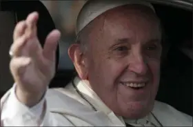  ?? LUIS HIDALGO — THE ASSOCIATED PRESS ?? Pope Francis waves as he arrives Jan. 15 at the San Luis Beltran church on his way to the Apostolic Nunciature in Santiago, Chile.