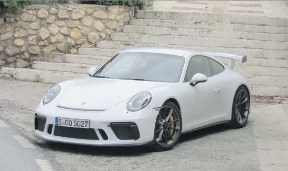  ?? PHOTOS: COSTA MOUZOURIS/DRIVING ?? By no means a commuter car, the 2018 Porsche 911 GT3 sacrifices some comfort on the street for exceptiona­l power on the track.