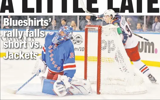  ?? AP ?? KING OF PAIN: Josh Anderson (right) celebrates after the Blue Jackets scored a goal on Henrik Lundqvist during the first period of the Rangers’ 6-4 loss to Columbus. Lundqvist, who allowed three goals on 16 shots, was pulled early in the second period...