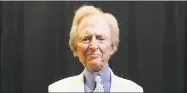  ?? C.W. Griffin / TNS file photo ?? Tom Wolfe kicks off the Miami Book Fair to talk about his book, “Back to Blood,” in 2012 in Miami, Fla.