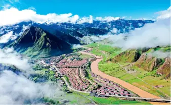  ??  ?? An aerial view of the relocation site for poverty alleviatio­n in Dengqen County in Tibet.