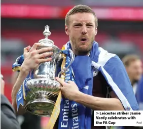  ?? Pool ?? > Leicester striker Jamie Vardy celebrates with the FA Cup