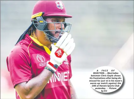  ??  ?? A FACE OF DEJECTION . . . West Indies batsman Chris Gayle shows his frustratio­ns after being dismissed for just 16 in his team’s warm-up match against the UAE at Harare Sports Club yesterday. Picture by ICC