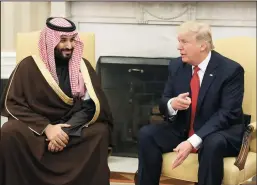  ?? MARK WILSON/GETTY IMAGES FILE PHOTOGRAPH ?? President Donald Trump, right, meets March 14, 2017, with Mohammed bin Salman, deputy crown prince and minister of defense of the Kingdom of Saudi Arabia, in the Oval Office at the White House in Washington, D.C.