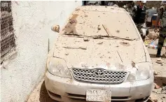  ?? — Reuters photo ?? A damaged car is seen after a suicide bomber blew himself up in Mecca, Saudi Arabia June 23.