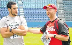  ?? DAN BARNES ?? Wide receiver Humberto Noriega chats with Calgary Stampeders head coach Dave Dickenson during the CFL combine held over the weekend in Mexico City.