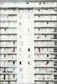  ??  ?? Red squares, the symbol of the student protest, pop in this photo from Pascal Dumont’s show, Le Grand Souffle.