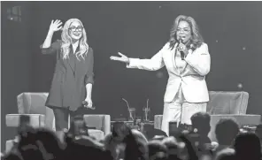  ?? JASON KOERNER/GETTY IMAGES FOR OPRAH ?? Lady Gaga and Oprah Winfrey speak during the WW (Weight Watchers Reimagined) & Oprah's 2020 Vision: Your Life In Focus Tour at BB&T Center on Jan. 4 in Sunrise, Florida.