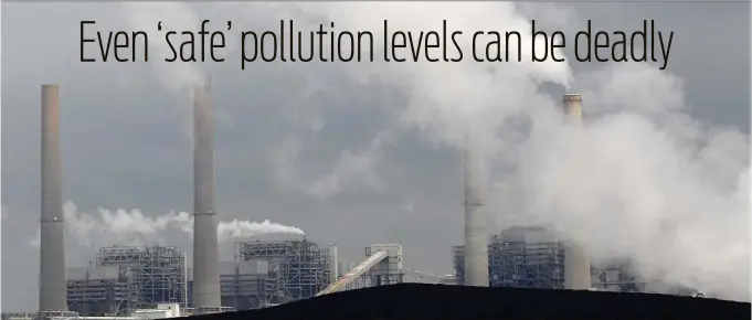  ?? David J. Phillip / Associated Press ?? Exhaust rises from smokestack­s in front of piles of coal in Thompsons. A study shows even levels below those considered safe can contribute to premature death.